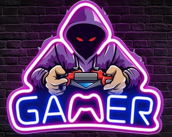 May include: Neon sign with a purple hooded figure holding a video game controller and the word "GAMER" in blue and purple neon letters.