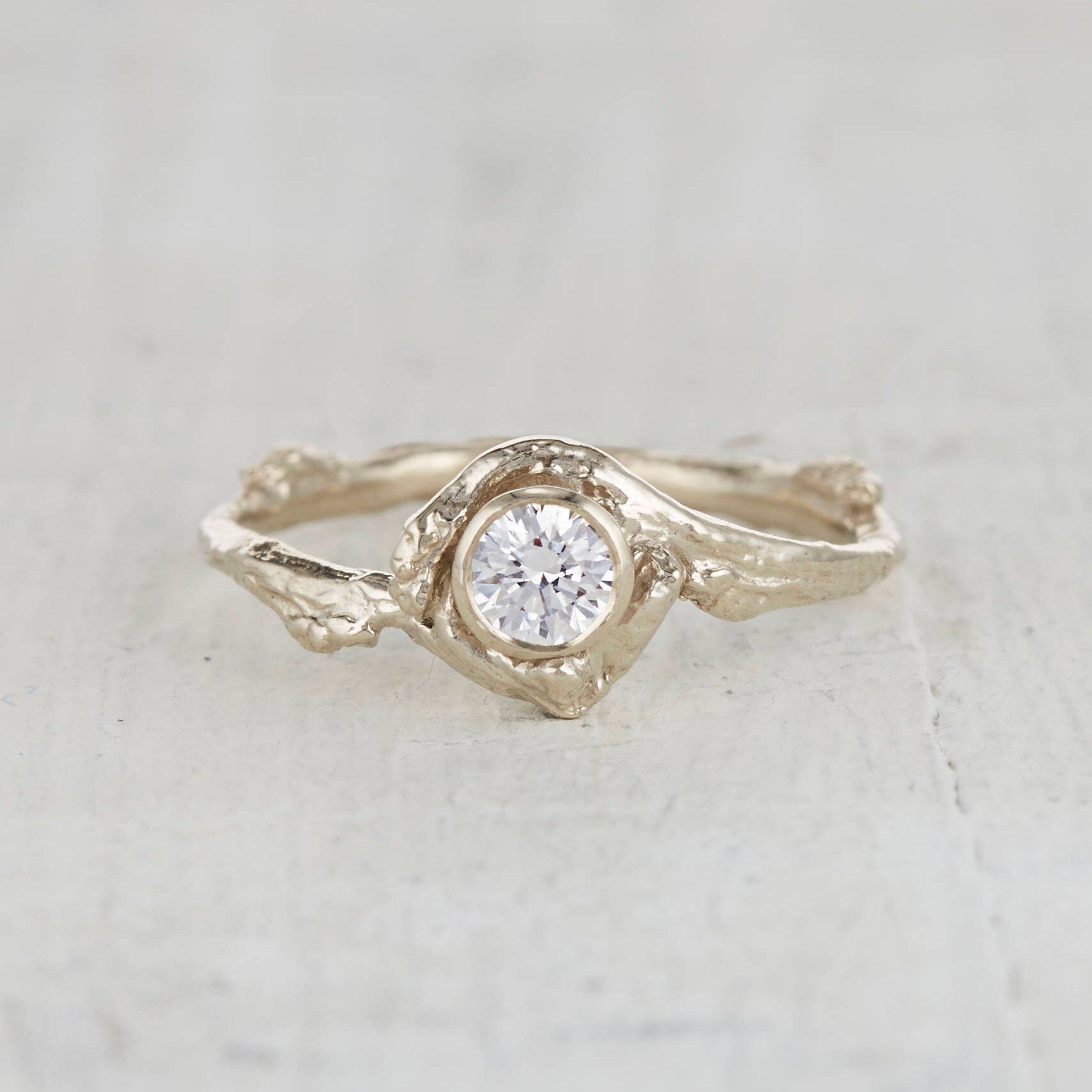 Low profile bezel set engagement best sale ring