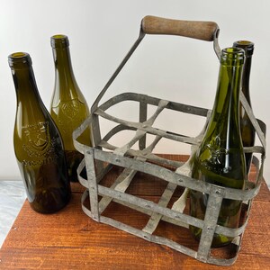 Vintage French metal wine crate, authentically aged, designed to hold 6 bottles of French wine.rustic touch,kitchen, living room