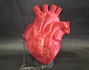 Bolso de mano con forma de corazón anatómicamente precisa