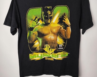 2008 WWE/ ミステリオ 総柄 レスリング Tシャツ 2008 WWE/ ミステリオ 総柄 レスリング Tシャツ 2008 WWE/ ミステリオ