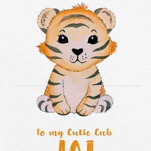 May include: A watercolour illustration of a cute tiger cub with orange and black stripes. The tiger is sitting with its paws tucked in. The text "To my Cutie Cub JAI" is written below the tiger.