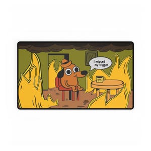 May include: A cartoon dog wearing a hat sits in a chair in a room engulfed in flames. The dog has large, wide eyes and a surprised expression. A speech bubble above the dog reads "I missed my trigger".