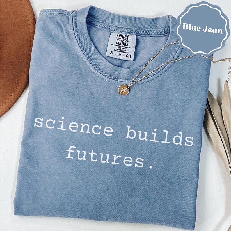 Science builds futures shirt, motivational tee, educational quote top, inspirational t-shirt, unisex casual wear, blue jean