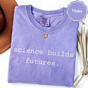 Science Builds Futures Shirt, Inspirational Science T Shirt, Motivational Quote Tee, STEM Support Top, Violet Shirt for Scientists