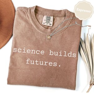 Science Builds Futures Tee, Inspirational Graphic T-Shirt, Motivational Science Shirt, Gift for Science Lovers, STEM Enthusiast Apparel