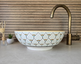 Handcrafted Ceramic Vessel Sink – Round washbasin with hand painted floral patterns, perfect for an elegant and unique bathroom | By Hands