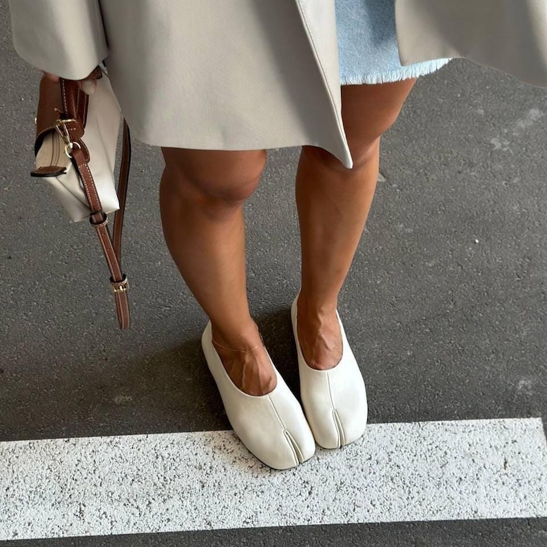 Women's split-toe milk leather tabi ballet flats with soft sole and minimalist barefoot design, ideal for fall casual wear