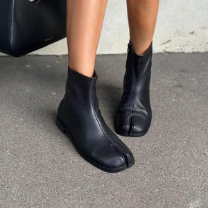 Black leather tabi boots