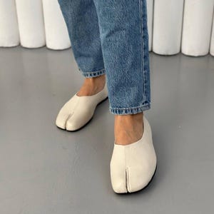 white leather tabi ballets