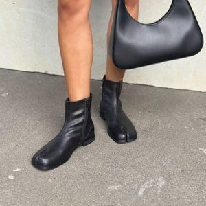 Black leather tabi boots