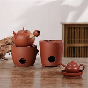 Set d'infusion de thé traditionnel du Guangdong : ensemble théière et réchaud à charbon de bois 700 ml en argile + ensemble théière Zhuni 120 ml et plateau Lao Anshun