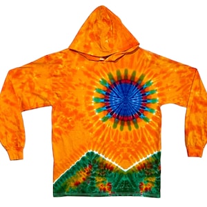 May include: Orange tie-dye hoodie with a green, blue, and red circular design. The hoodie has a long sleeve and a hood.