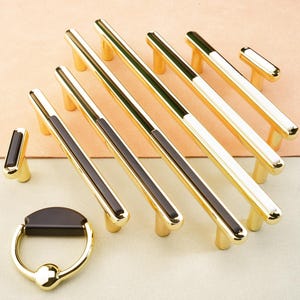 May include: A handmade, wooden cutting board with a natural finish. The board features a live edge on one side and a rectangular shape. It is approximately 18 inches long and 12 inches wide.