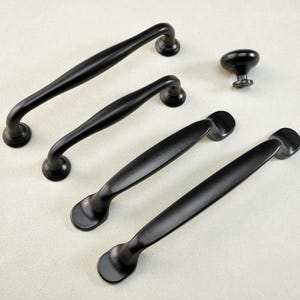 Tiradores de gabinetes de cocina de varios estilos, manijas de puertas modernas negras, manijas de cajones de tocador, manijas de armario, manijas de alacena, manijas redondas, herrajes