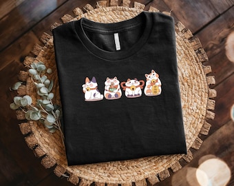 Maglietta Maneki Neko, maglietta grafica con gatto kawaii, maglietta unisex in cotone, regalo perfetto per gli amanti dei gatti e i fan kawaii, grazioso design con gatto che fa cenno,