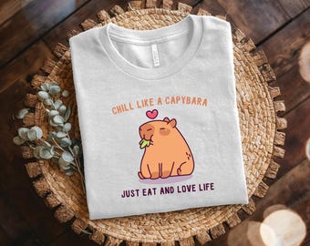 Maglietta Chill Like A Capybara, comoda maglietta unisex in cotone - Regalo per gli amanti del capibara, appassionati della fauna selvatica, abbigliamento casual per gli amanti degli animali, divertente