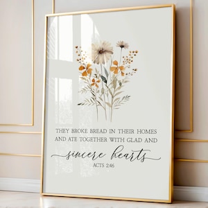 May include: A watercolor painting of a bouquet of flowers with a quote from the Bible, Acts 2:46, that reads "They broke bread in their homes and ate together with glad and sincere hearts."