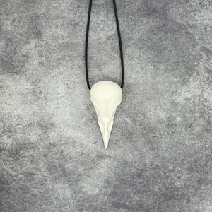 Front view of Ginger Snaps Movie Bird Skull Necklace Crow Pendant - Goth Gingersnaps Gift Dark Tower Faux Taxidermy Bone Jewelry Bones Necklace Viking