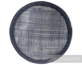 May include: A navy blue round hat base made of woven straw. The base is designed for millinery and hat making.