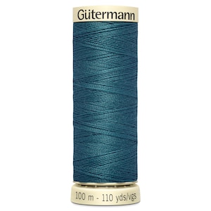 May include: A teal-coloured spool of Gütermann sewing thread. The cylindrical spool has a white base and a white top with the Gütermann logo. The label indicates 100 m or 110 yds of thread.