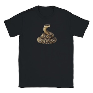 May include: Black t-shirt with a graphic of a coiled rattlesnake.