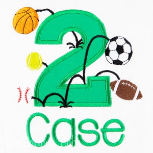 May include: Green number two with a baseball, basketball, soccer ball, football, and baseball bat. The name "case" is written below the number.