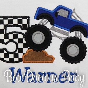 Personalized monster truck birthday shirt. Custom monster truck birthday shirt. Appliqued, embroidered monster truck birthday shirt. Monster truck climbing dirt. Monster truck number shirt.