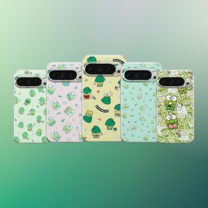 May include: Five phone cases with a cartoon frog design in various colors. The cases feature a camera cutout and are decorated with repeating frog illustrations and musical notes. The background is a gradient of green.