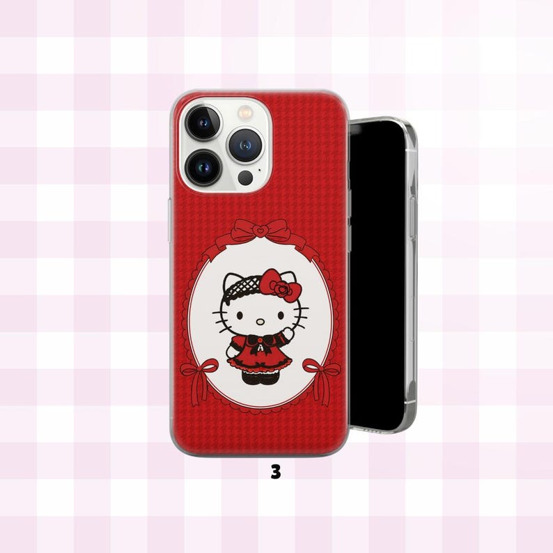May include: Red phone case with a Hello Kitty design. The case has a textured pattern and a white oval with a Hello Kitty illustration wearing a red dress and bow. Another phone is visible to the right.