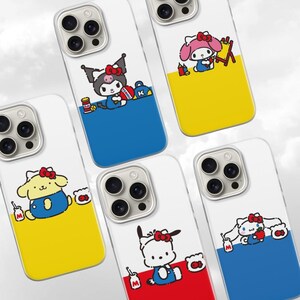 May include: A collection of clear phone cases featuring colorful cartoon character designs. Each case has a white top section and a bottom section in blue, yellow, or red. The cartoon characters are in various poses, with some holding objects.