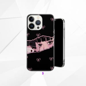 May include: Black phone case with a design featuring a cartoon character peeking through a torn paper effect. The design includes pink bows and the number 5. The phone case is shown next to a phone.