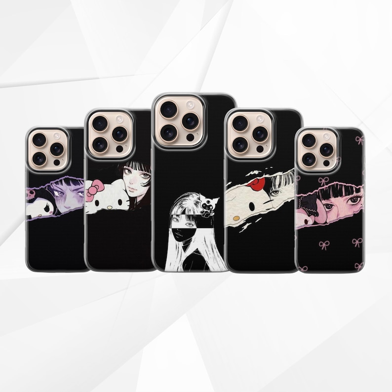 May include: A selection of black phone cases with anime-style illustrations. The designs include a girl with black hair, a Hello Kitty character, and other unique graphics. The cases have a glossy finish and are arranged in a row.