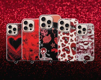 May include: A collection of five phone cases with various designs. The cases feature a black heart, red butterfly and floral patterns, a black case with a skeleton, and cases with heart and lip prints. The cases are displayed against a red glitter background.