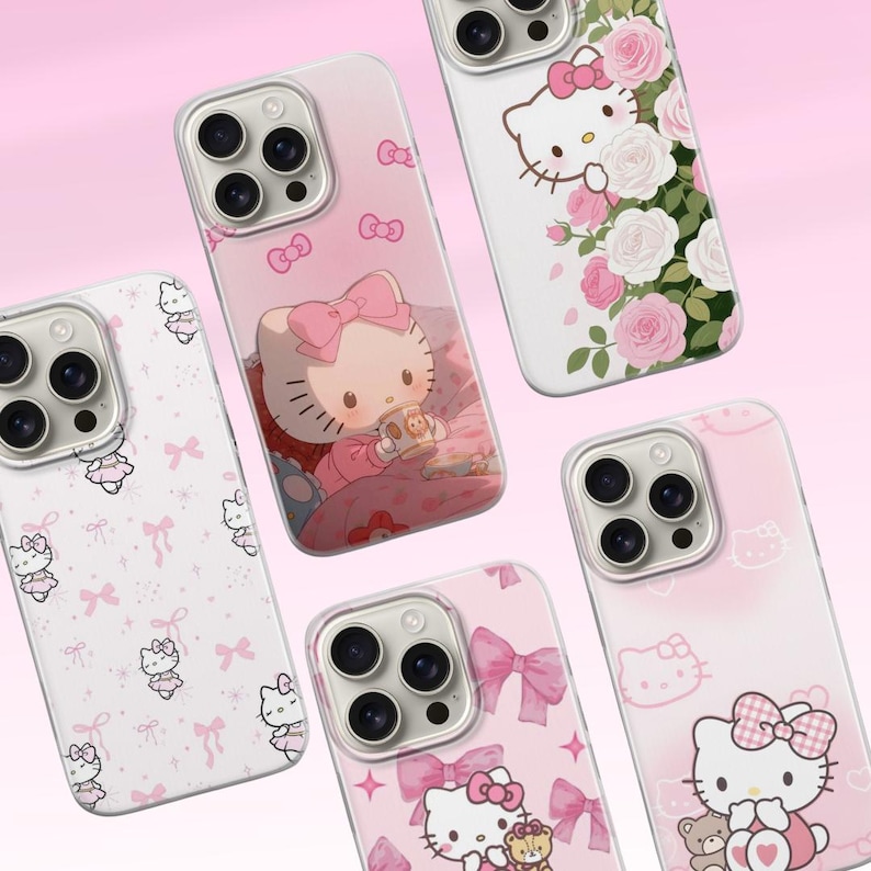 May include: A collection of pink and white phone cases featuring Hello Kitty designs. The cases showcase various illustrations, including bows, roses, and the iconic character with a teddy bear. The cases are designed to fit a smartphone with a multi-lens camera.