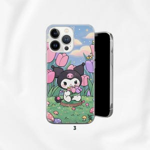 May include: Clear phone case featuring a cartoon character in a garden of pink and purple tulips. The character is black and white with a pink nose and is holding a bouquet of flowers. The background includes a blue sky with clouds and stars. The number "3" is printed at the bottom.