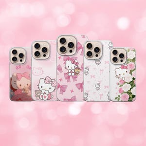 May include: A collection of five pink phone cases featuring Hello Kitty designs. The cases showcase various illustrations of Hello Kitty with bows, teddy bears, and floral patterns. The cases have a glossy finish and are set against a pink background.