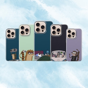 May include: Five phone cases featuring cartoon character designs. The cases are in various colours, including teal, green, navy, black, and lavender. Each case has a different image of the cartoon characters. The cases have a clear border.