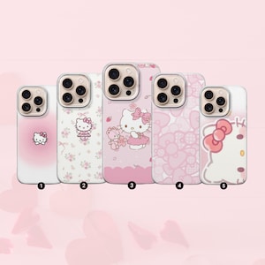 May include: Five pink phone cases featuring Hello Kitty designs. The cases showcase various patterns, including a gradient, floral, heart shapes, and the iconic character with a bow. Each case has a different design.