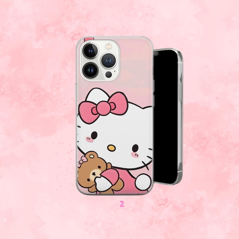 Puede incluir: Funda transparente para tel&eacute;fono con un personaje de dibujos animados rosa y blanco con un lazo rosa y un osito de peluche. La funda est&aacute; sobre un fondo rosa. El n&uacute;mero 2 est&aacute; impreso en la parte inferior de la funda.
