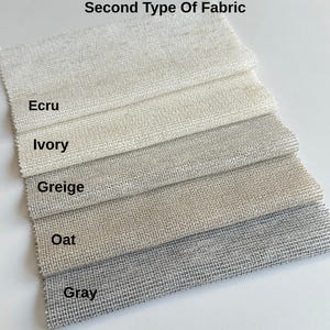 Pode incluir: Cinco amostras de tecido retangulares rotuladas como Second Type Of Fabric, dispostas em uma pilha. As cores de cima para baixo s&atilde;o rotuladas como Ecru, Ivory, Greige, Oat e Gray. Cada amostra apresenta uma textura tecida vis&iacute;vel.