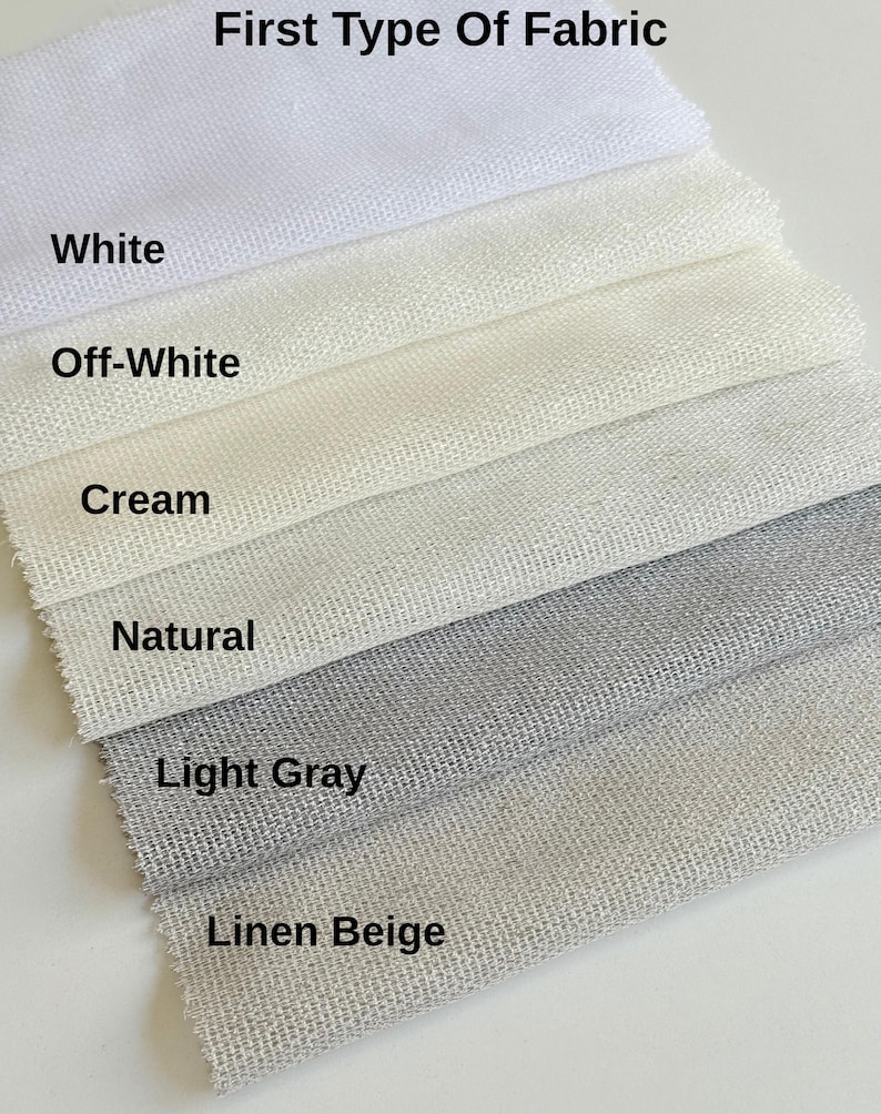 Pode incluir: Uma cole&ccedil;&atilde;o de amostras de tecido rotuladas como First Type Of Fabric, apresentando seis cores distintas dispostas em camadas: White, Off-White, Cream, Natural, Light Gray e Linen Beige. Cada amostra exibe uma textura tecida vis&iacute;vel e uniforme.