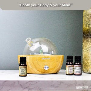 Aromatherapie-Vernebelungs-Diffusor: Bambusbasis mit ätherischen Ölen