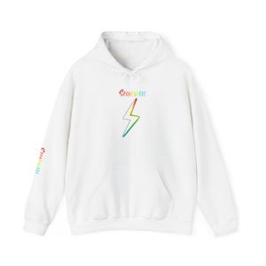 May include: A white hooded sweatshirt featuring a rainbow-coloured lightning bolt graphic on the chest with the text "SPOKEISHERE" above it in matching rainbow colours. The same text is printed vertically in rainbow colours on the right sleeve.