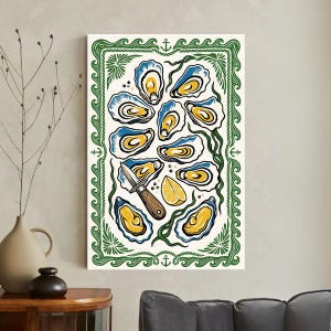 May include: A decorative print featuring stylized oysters with blue and yellow details, a knife, and a lemon slice. The artwork is framed with a green border adorned with anchors and wave patterns, creating a nautical theme.