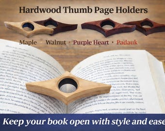 May include: Hardwood thumb page holders in maple, walnut, purple heart, and padauk wood. The image shows the page holders on top of an open book. The text reads "Keep your book open with style and ease!"