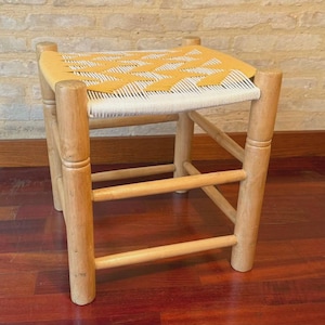 Solid fir wood stool with hand-woven cotton seat