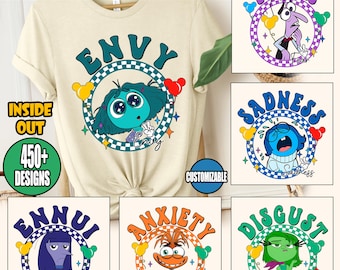 May include: A cream-colored t-shirt featuring a graphic of the character Envy from the movie Inside Out, surrounded by a circle with the word "Envy". Additional designs of other characters are shown. Text on the image reads "READY TO PRESS DTF TRANSFER", "INSIDE OUT", "450+ DESIGNS", and "CUSTOMIZABLE".