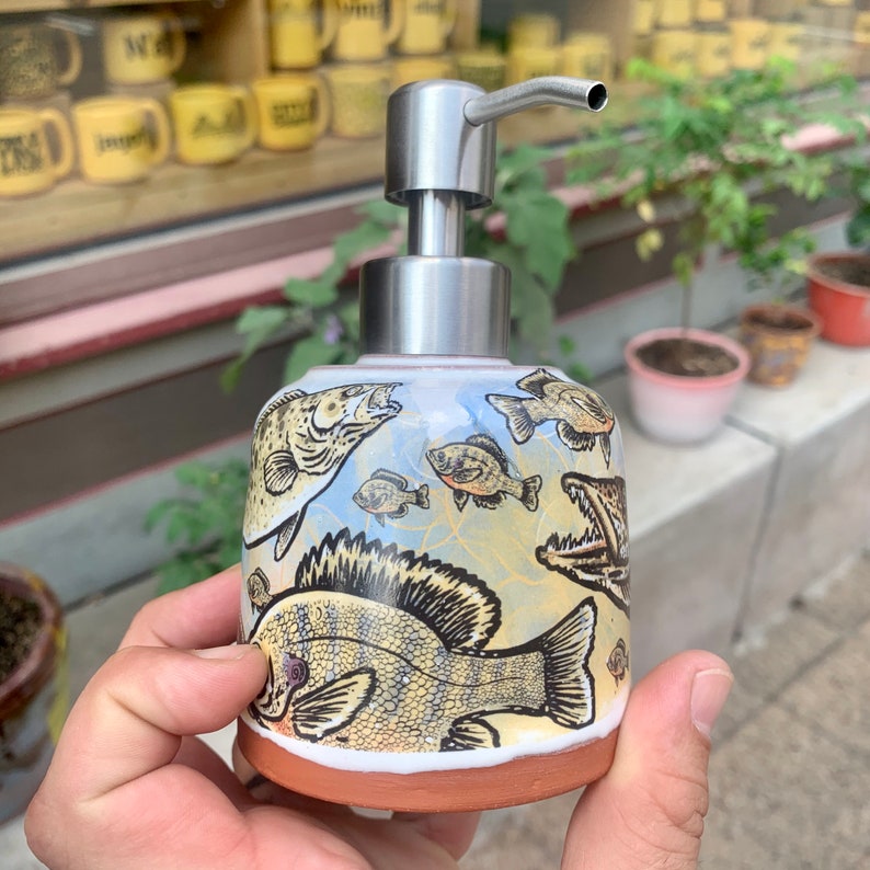 soap dispenser with floating fish