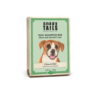 May include: A green and brown bar of dog shampoo with a cartoon boxer dog illustration. The bar is labeled "Soapy Tails Dog Shampoo Bar Short and Smooth Coats Citrus & Mint with Flea & Itch Relief 4.75 oz. 135 g Angel 10"